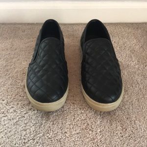 Black leather quilted Steve Madden slip on sneaker